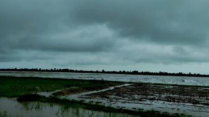 Sticker - Beautiful Shot Of Gujarat Rural Road And Weather Season Clouds Photo