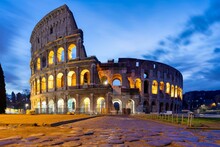 Mesmerizing View Of The Colosseum In Rome At Dawn