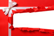 Red gift wrap torn open strip isolated transparent background photo PNG file