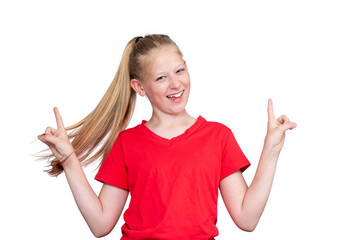 portrait of a happy smiling girl in a red t-shirt raising her hands up in a sign, isolated on a whit