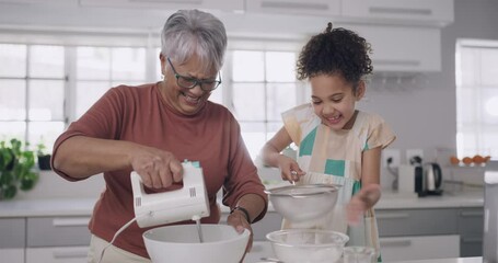 Sticker - Baking, teaching and learning grandmother and little girl having fun cooking in a family kitchen. Smiling, happy and laughing senior female and cute child bonding and enjoying the day together inside