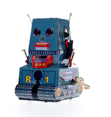 Retro robot toy on white background