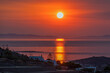 Red Stunning Sunset. Copy Space.  Sunset on the island of Syros in Greece. Stock Image.