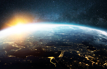 Wall Mural - amazing beautiful blue planet earth with a beautiful orange sunset, view from space. horizon earth w