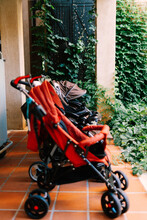 Row Of Baby Stroller Parked In The Street