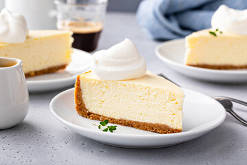 Classic New York cheesecake with a dollop of whipped cream