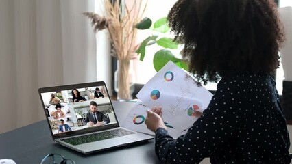 Wall Mural - Multiracial business people on laptop screen. African american clever woman, company coworker, having online financial brainstorm by video conference with successful colleagues, discuss financial plan