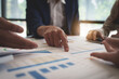 © itchaznong - Success business team. Business data dashboard analysis by brainstorming