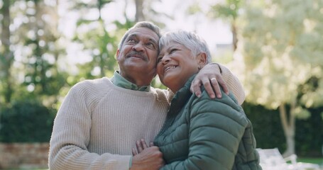 Wall Mural - Happy, smiling and mature couple in retirement, bonding and enjoying the outdoors and relaxing together in nature. Romantic, loving and mature husband and wife in love and hugging in summer outside