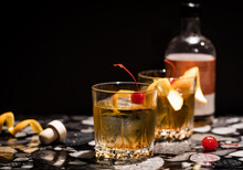 Old Fashioned Drinks Against A Black Background. Selective Focus On Front Glass.