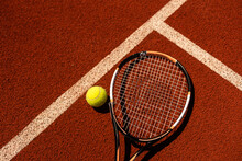 A Broken Tennis Racket Blue Tennis Court.