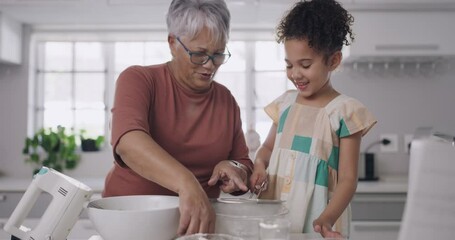 Poster - Grandmother and child baking, cooking and making a cake, dessert and homemade cookies or biscuits in a home kitchen. Cute, fun and little girl helping elderly senior, bonding and learning how to bake