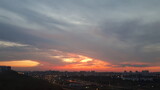 Fototapeta Las - sunset over the city