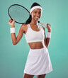 © Talia M/peopleimages.com - Female tennis player posing with racket, getting ready for competitive match and looking sporty while standing against blue studio background. Active, fit and happy professional sports person