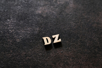 Wall Mural - The letters D and Z above the dark field. Initials DZ