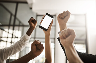 Leinwandbilder - Hands of business people cheering, celebrating good news on a phone with blank screen for copy space. Excited team of office workers showing power fist gesture for success, victory and winning