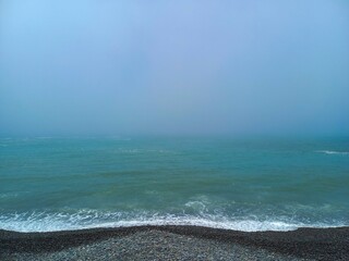 Sticker - Panoramic view of a beach on a winter day.