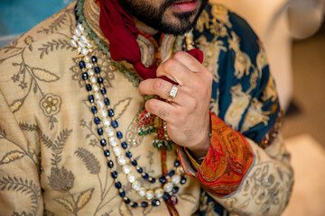 Indian Punjabi Sikh groom's wedding outfit, textile, fabrics and texture