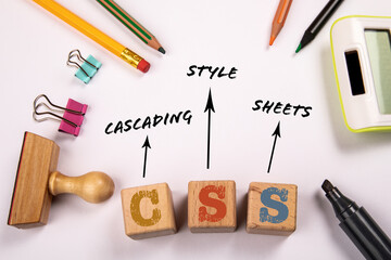 Wall Mural - css - cascading style sheets. text on a white office table