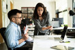 © JustLife - Colleagues arguing in office. Angry businesswoman yelling at her collegue