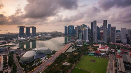 Wall Mural - Singapore skyline time lapse from sunset to night, aerial view