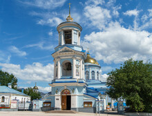 White Building Of Pokrovsky Cathedral With Blue Roof And Golden Domes. Temple Of Voronezh Diocese Of Russian Orthodox Church.  Russian Classicism Architecture. Voronezh, Russia - July 30, 2022