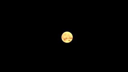 Wall Mural - real full moon on black (with added alpha channel). time lapse.