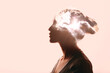 Leinwandbild Motiv Atmosphere pressure and woman mental health contemplation concept. Multiple exposure clouds and sun on female head silhouette.
