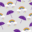 Vector illustration. Seamless pattern with umbrellas, clouds and colorful rainbows for kids holidays, textiles, interior design, book design.