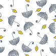 Seamless pattern with umbrellas and leaves. Fabric background for kids clothing and paper products. 