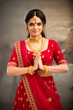 Beautiful  Indian bridal greeting in studio shot.