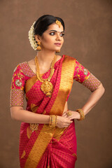 Sticker - Beautiful Indian young Hindu Bride jewelry on studio shot.