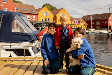 Wall Mural - Beautiful town Kristiansand in Norway, family visiting Norway for summer vacation