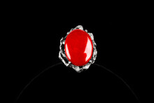Silver Ring With Coral Stone On Black Background