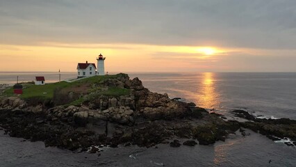 Wall Mural - Nubble Lighthouse in Maine Drone Video at Sunrise 