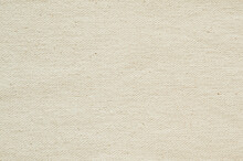 Close-up Texture Of Natural Weave Cloth. Champagne Gold Fabric Background. Natural Linen Or Cotton Textile Material.