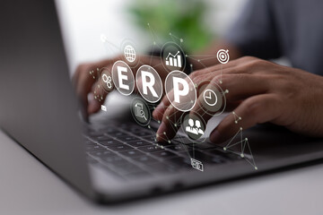 Fototapete - An IT manager looks at the architecture of ERP (Enterprise Resource Planning) ERP, enterprise resource planning, concept of productivity and improvement.