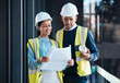 © Emily Norris/peopleimages.com - Architect, construction engineers and builder partners with building blueprints planning together. Contractor colleagues in collaboration on development of engineering design plans for future project