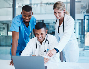 Doctors, medical professionals or healthcare workers with laptop talking, meeting or planning medicine treatment. Diverse group of happy clinic frontline colleagues researching virus cure in hospital