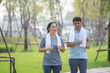 © Suriyo - Asian people older couple retirement workout in city park