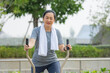 © Suriyo - Old Asian woman exercise outdoor, Asian woman happy retirement