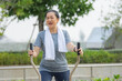 © Suriyo - Old Asian woman exercise outdoor, Asian woman happy retirement