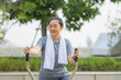 © Suriyo - Old Asian woman exercise outdoor, Asian woman happy retirement