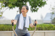 © Suriyo - Old Asian woman exercise outdoor, Asian woman happy retirement