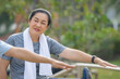 © Suriyo - Old Asian woman exercise outdoor, Asian woman happy retirement