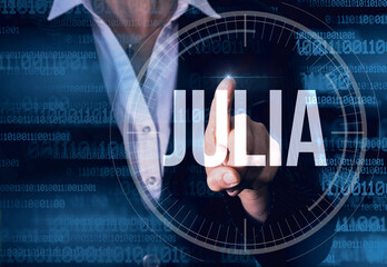 Wall Mural - business woman with finger pressing julia button on virtual screens. modern technology concept