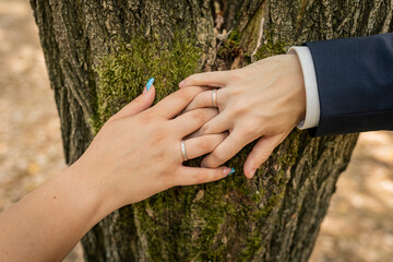 Wall Mural - bride and groom holding hands