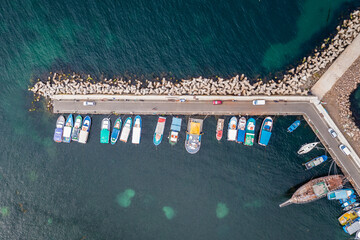 Wall Mural - Drone photo of breakwater in Northern port in Old Town of Nesebar seaside city on Black Sea shore in Bulgaria