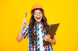 © Olena - Teenager child painter in helmet with clipboard. Child in hard hat. Kid engineer on construction site. Renovation and repair.