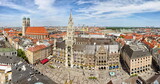 Fototapeta  - Panoramic view of the old medieval Gothic architecture City Hall building at Marienplatz. Square.  Munich, GERMANY - August 2022